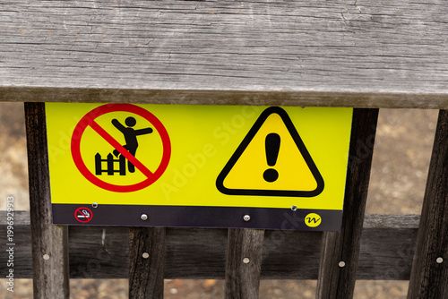 Warning Symbol Sign Wooden Fence Outdoors