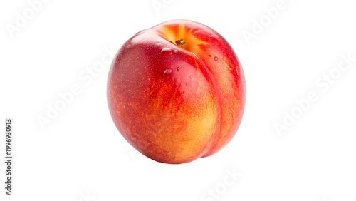 Fresh nectarine with droplets of water sitting on a plain white background