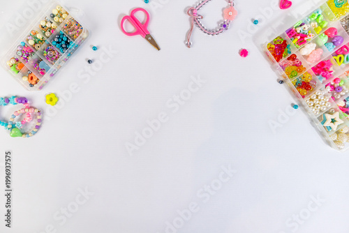 Craft creativity concept background wallpaper, beads scissor string and bracelet