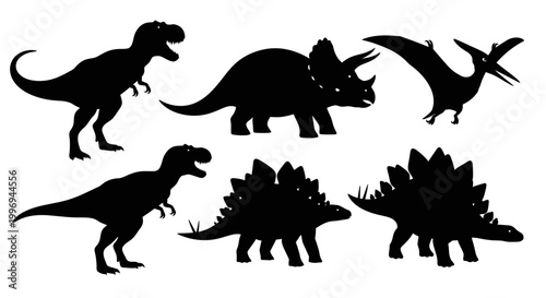 Silhouettes of various dinosaurs standing.