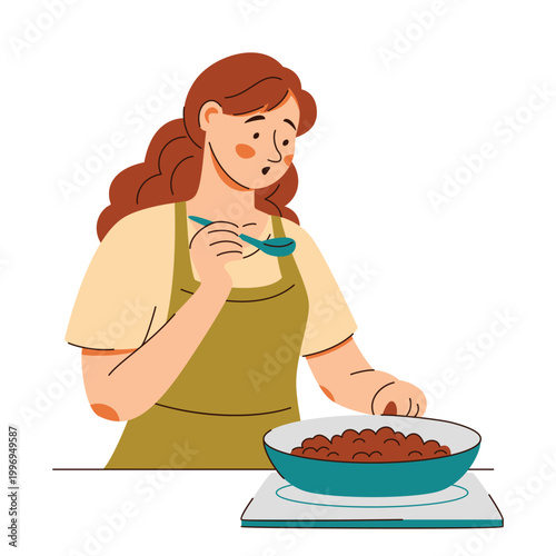 Girl in apron fries food in frying pan and tastes it. Cozy home cooking scene featuring healthy food