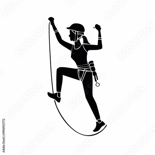 Silhouette of a Woman Rock Climbing