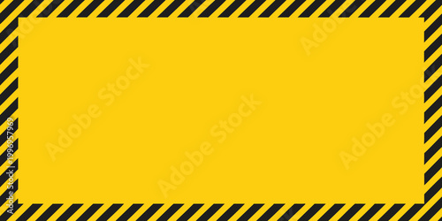 A yellow square framed by bold black and yellow diagonal striped borders