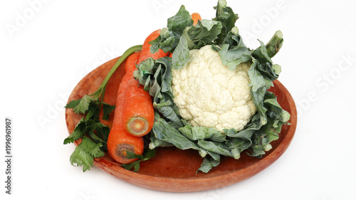 Cauliflower , brassica oleracea , bunga kol or kembang kol on wooden plate