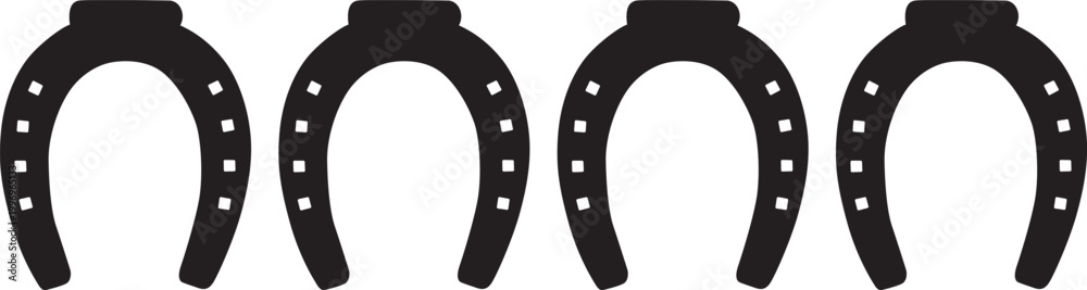 Fototapeta premium Four black horseshoes with white nails