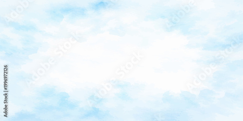 A beautiful clear blue sky with fluffy white clouds on a bright sunny summer day creates a natural heaven-like atmosphere in this peaceful outdoor cloudscape