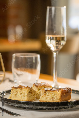 Traditional Pastiera Napoletana cake served on a rustic restaurant table
