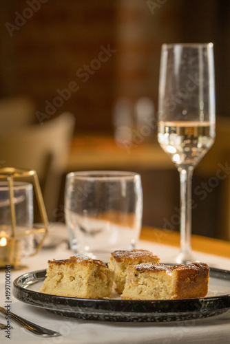Traditional Pastiera Napoletana cake served on a rustic restaurant table