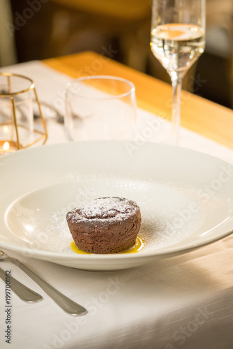 Elegant presentation of a classic Italian dessert served in a fine dining setting. The image captures the rich textures, delicate plating, and appetizing details of an artisanal sweet treat