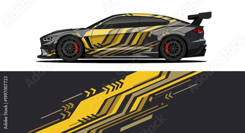 Sleek race car with bold yellow and black graphics racing livery on track.