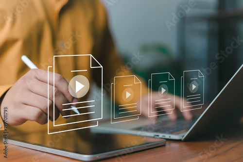 Foto Digital content management concept with person using stylus on tablet and laptop