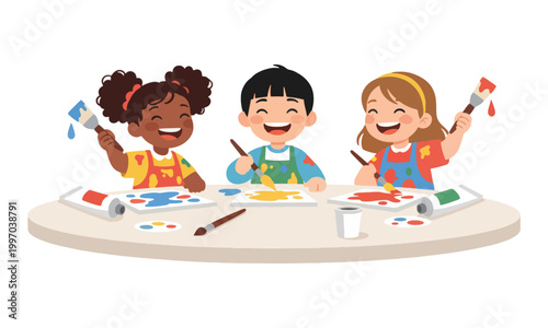 Happy diverse children painting with brushes and paints at table