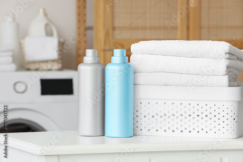 Basket with white towels an...