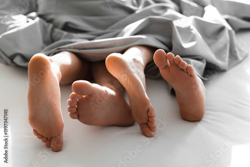 Konstfotografi Lovely couple having sex in bed, closeup