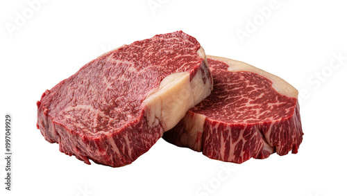 Photos Raw marbled Wagyu beef steaks stacked close up