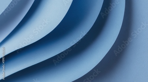 Abstract Blue Textured Curving Layers with Soft Lighting Creating Depth and Smooth Transitions in a Minimalist Design