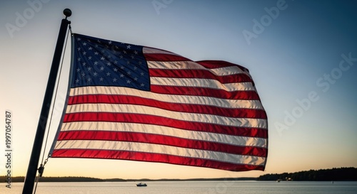 Patriotic 4th of july celebration american flag waving against a sunset sky