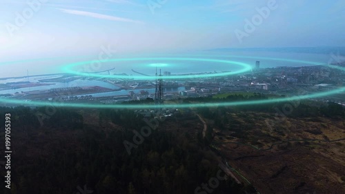 Aerial of 5G Antenna on Hill Emitting Pulsing 3D Glowing Radio Waves. Cellular tower with digital motion graphics representing signal transmission. Perfect for telecommunications, 5G technology.