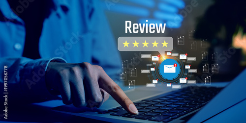 Customer review concept. Hand touching laptop keyboard with five star rating and email notification interface, user feedback response system, online reputation management, service quality improvement