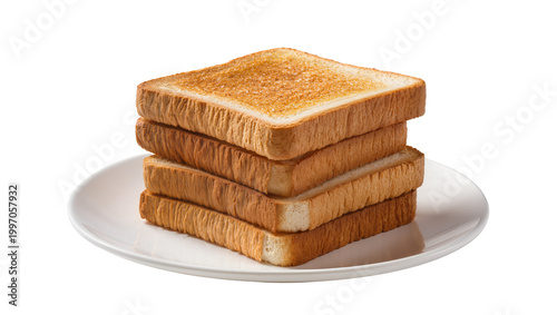Fotografía Stacked golden toasted bread slices on a white ceramic plate