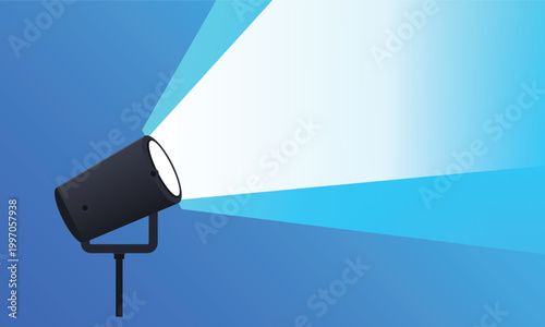 A black spotlight on a stand emitting a bright, wide beam of white and blue light against a solid blue background.