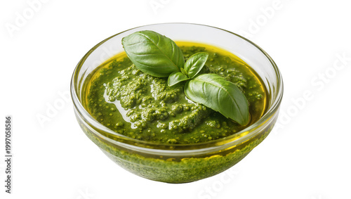 Green Pesto Sauce in Glass Bowl Garnished with Fresh Basil Leaves