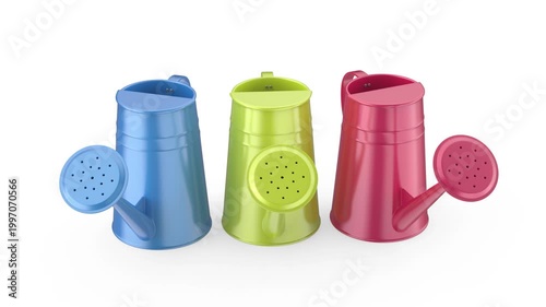 Three colorful watering cans on white background