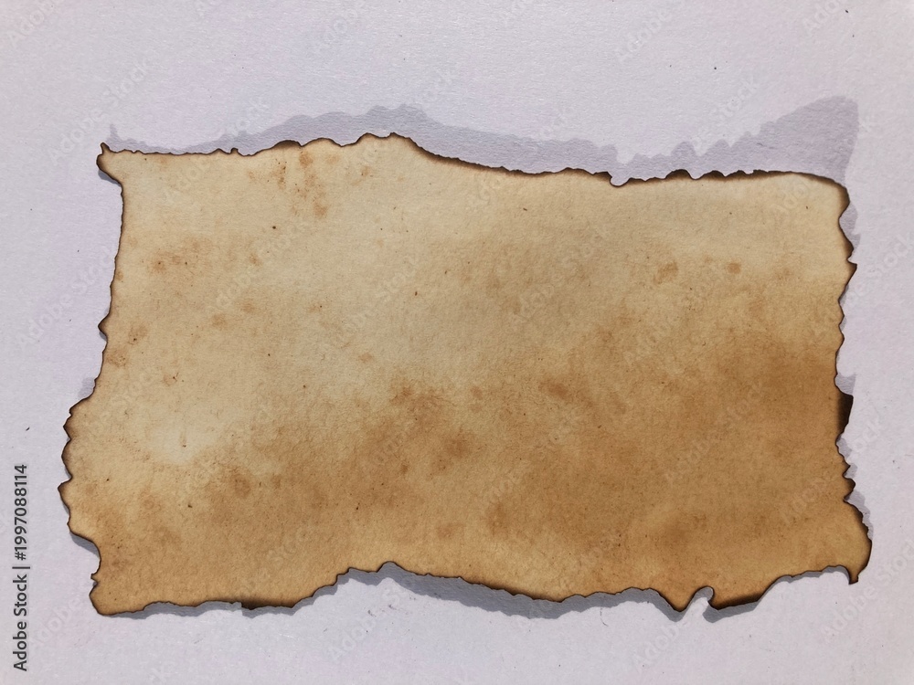 Fototapeta premium Burnt Paper Texture & Charred Edges. Antique paper concept. Rough burnt texture paper. 