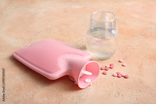 Hot water bottle with glass...