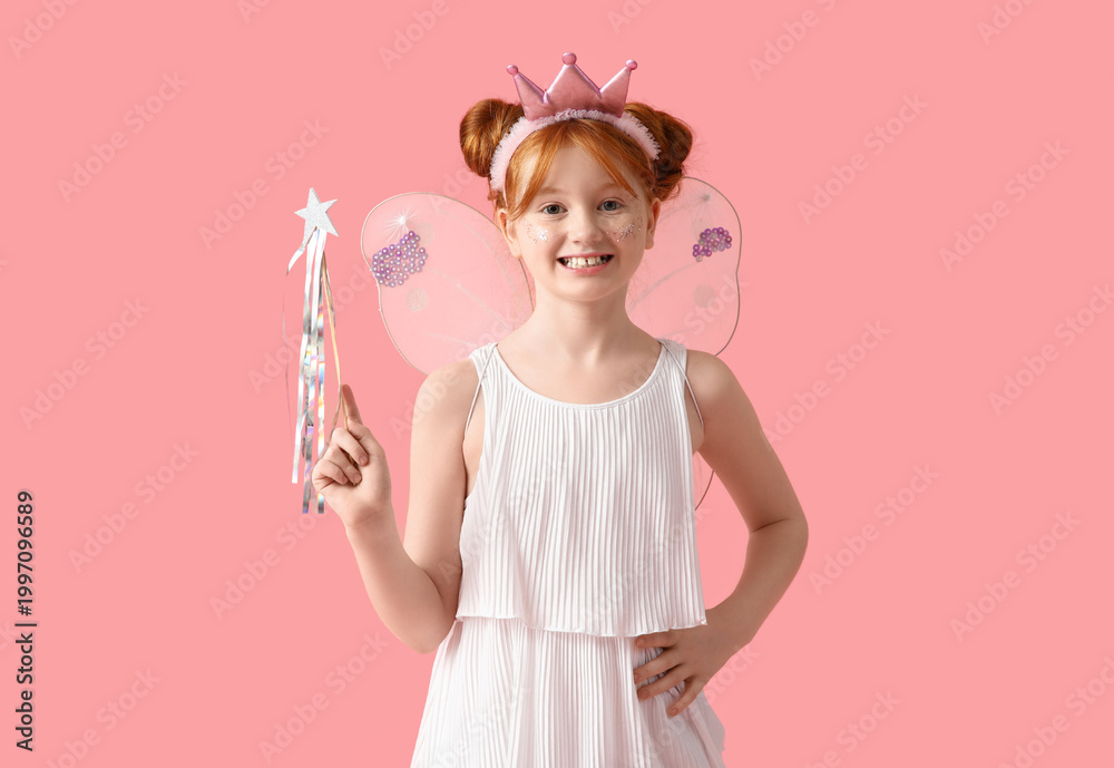 Fototapeta premium Cute girl in fairy costume with magic wand on pink background