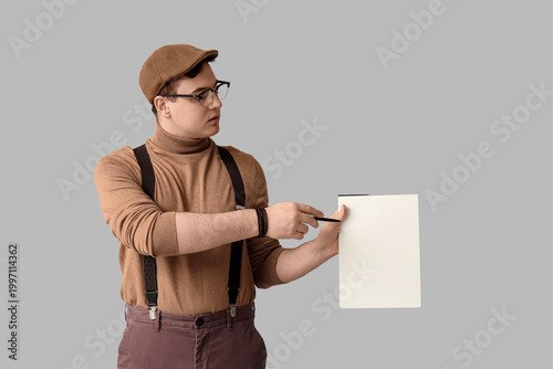 Young writer with notebook ...