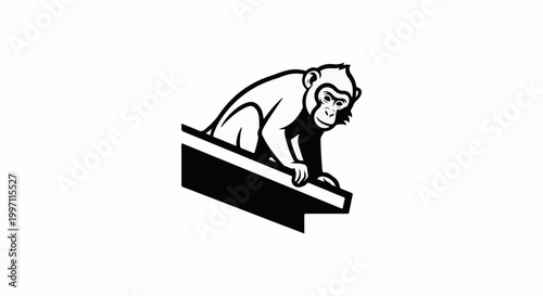 A black and white cartoon monkey sits perched on a dark angled surface