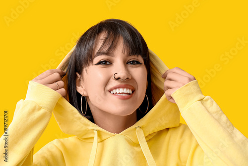 Happy stylish young woman w...