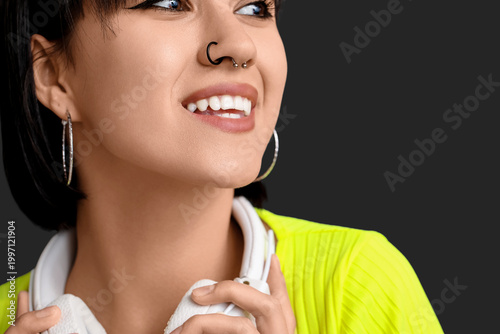 Stylish young woman with no...