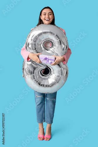 Happy young woman with silv...