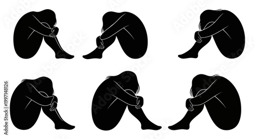 Six black silhouette figures in fetal position on white background