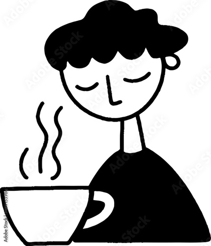 Person smelling steaming cup while sitting at small table