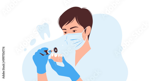 Dentist working on a dental prosthesis with a tool, wearing mask and gloves