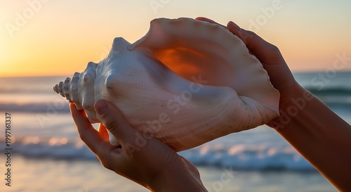 woman holding a seashell