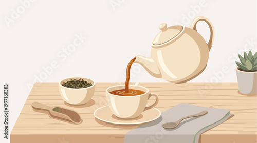 A ceramic teapot pours hot tea into a matching cup and saucer, surrounded by loose tea leaves, a wooden scoop, and a small potted plant on a light wood surface.