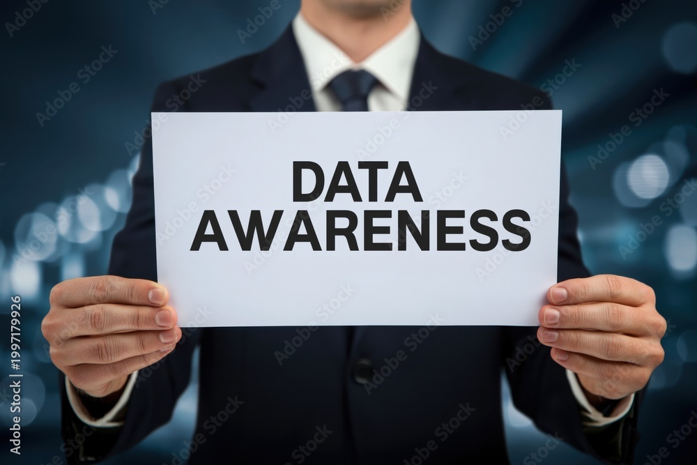 Obraz premium IT professional holding a sign to promote Data Awareness