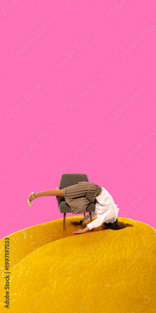 Ταπετσαρία Woman bent upside down on chair placed on giant lemon in surreal scene