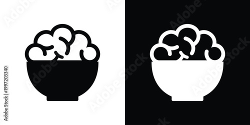 A simple icon featuring a human brain placed inside a bowl. A conceptual illustration representing "brain food," mental nourishment, mindful eating, cognitive health, and psychological well-being.