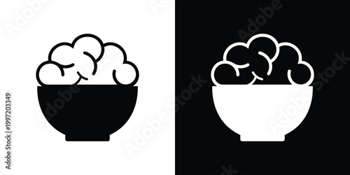 A simple icon featuring a human brain placed inside a bowl. A conceptual illustration representing "brain food," mental nourishment, mindful eating, cognitive health, and psychological well-being.