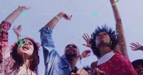Cheering crowd raising hands at outdoor festival, with flower crown, denim jacket, headphones