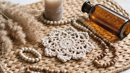 Boho Decor Flatlay with Macrame Coaster, Pampas Grass, Amber Glass Bottle, Ceramic Beads and Neutral Candle on Woven Rattan in Soft Natural Light