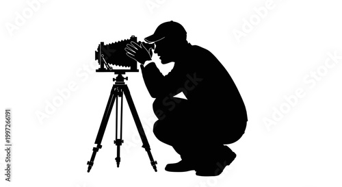 Photographer Silhouetted with Vintage Camera Capturing a Scene.