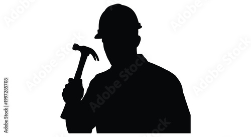 Construction worker holding a hammer a dramatic black shape silhouette