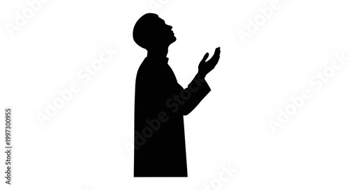 Silhouette of a Man Praying with Hands Raised Upwards.