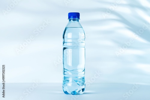 Water Bottle Filled With Clear Water on a White Background